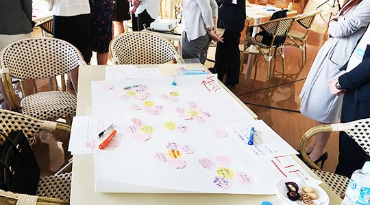 Female engineer networking cafe